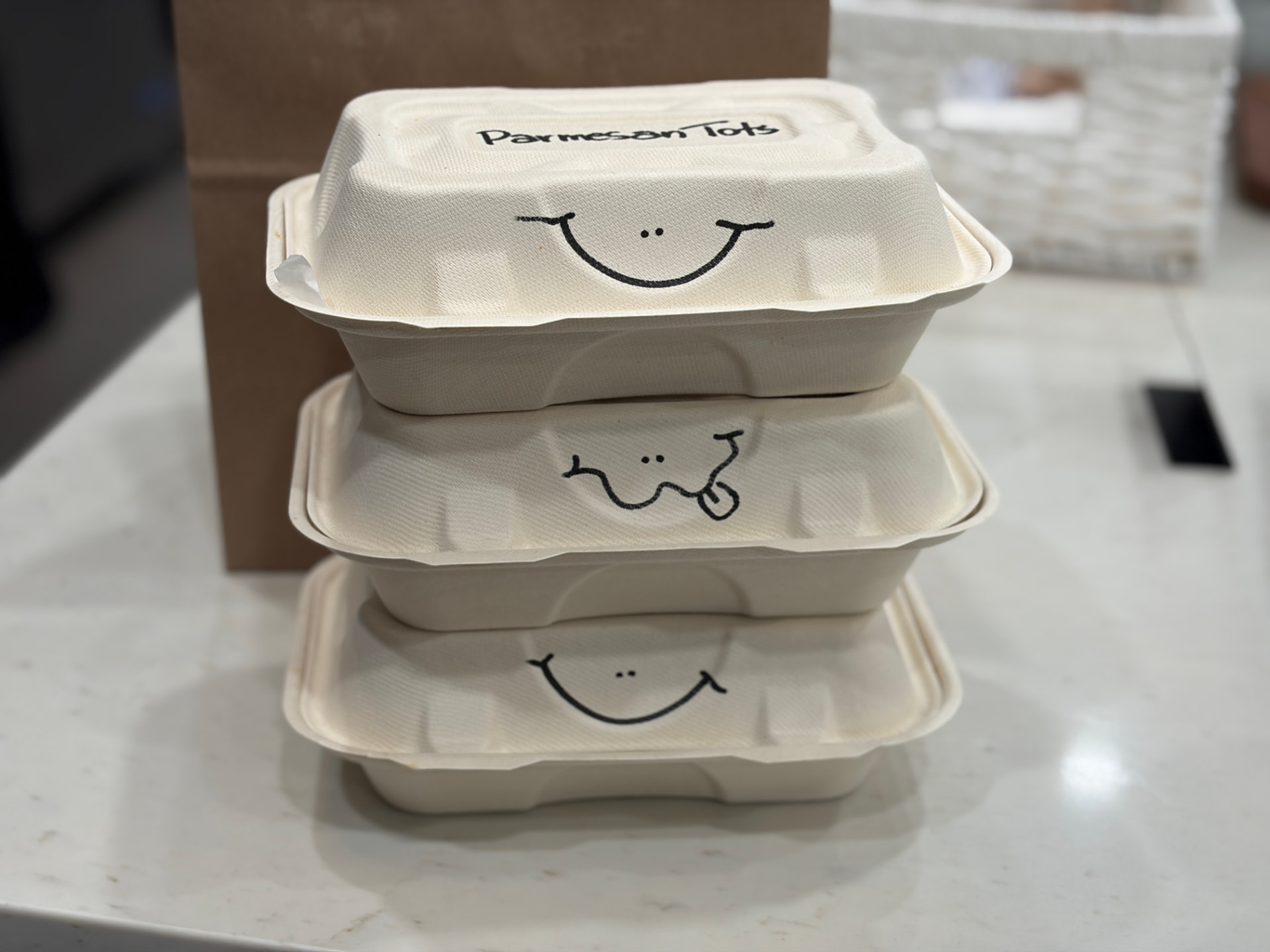 Stacked charQterie takeout boxes ready for catering